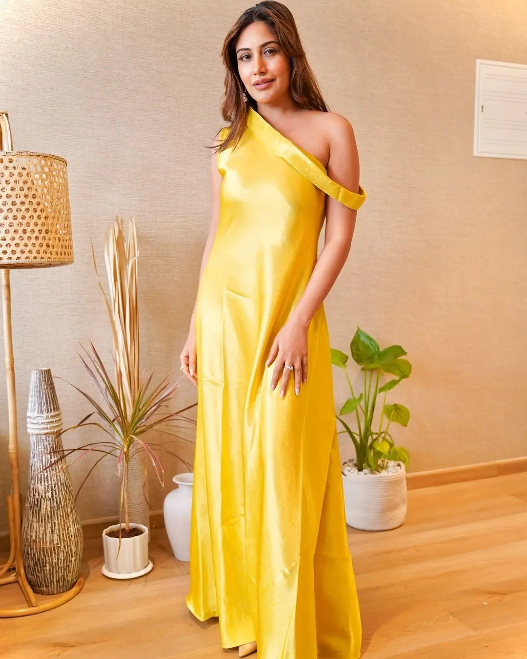 Indian Actress Surbhi Chandna in Sleeveless Yellow Gown